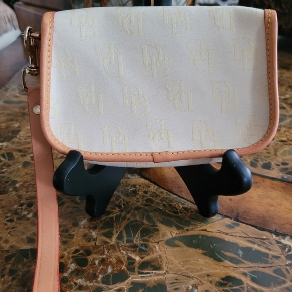 Dooney and Bourke Elegant Cream and Tan Women's pouch - Picture 2 of 4